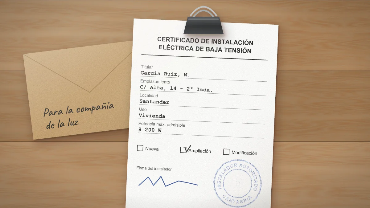 Certificado de instalación eléctrica con el sello del instalador, sujeto con una pinza sobre una mesa de madera